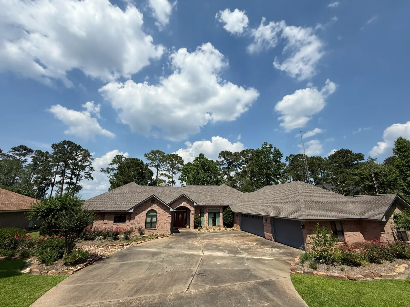 Architectural shingle roof on a brick home in East Texas